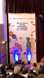 Identité visuelle déclinée sur différents supports de communication (kakémono, programme, badge...) pour les 13è rencontres sur le Cancer, organisées par M&M Conseil.
